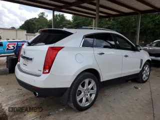2014 Cadillac SRX Premium Collection with VIN 3GYFNDE32ES651159, listed as a Copart auction lot 61543815 with 177,289 mi miles and Salvage title. Bid and sale history available at DreamBid. Image 3.