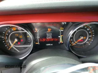 2023 Jeep Wrangler Rubicon with VIN 1C4HJXCGXPW545938, listed as a Copart auction lot 73939634 with 13,590 mi miles and Salvage title. Bid and sale history available at DreamBid. Image 9.