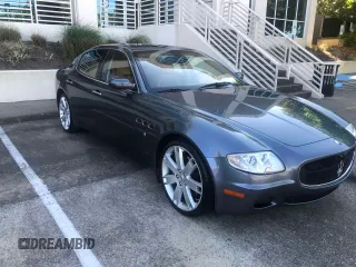 2006 Maserati Quattroporte z VIN ZAMCE39A860026491, wystawiony jako Copart lot #41541815 z przebiegiem 65 169 mil mil oraz Tytuł czysty. Historia ofert i sprzedaży dostępna na DreamBid. Obrazek 1.