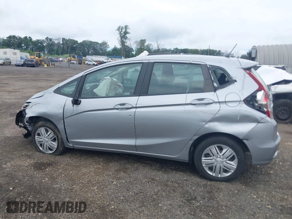 2019 Honda Fit LX z VIN 3HGGK5H45KM725916, wystawiony jako IAAI lot #42654907 z przebiegiem 92 580 mil mil oraz . Historia ofert i sprzedaży dostępna na DreamBid. Obrazek 14.
