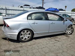 2010 Honda Civic LX with VIN 2HGFA1F57AH586100, listed as a Copart auction lot 50066965 with 192,401 mi miles and Salvage Title. Bid and sale history available at DreamBid. Image 3.