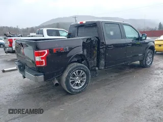 2019 Ford F-150 XL with VIN 1FTFW1E13KFC63843, listed as a IAAI auction lot 41682862 with 102,390 mi miles. Bid and sale history available at carsss.com. Image 4.