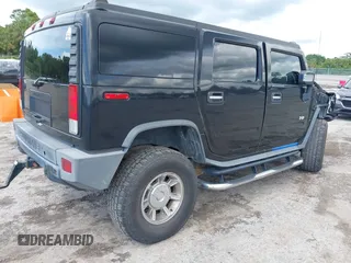 2007 Hummer H2 SUV z VIN 5GRGN23U57H112295, wystawiony jako IAAI lot #42257618 z przebiegiem 183 991 mil mil oraz . Historia ofert i sprzedaży dostępna na DreamBid. Obrazek 4.