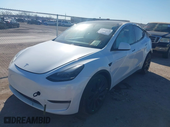 2023 Tesla Model Y Performance with VIN 7SAYGDEF1PF864976, listed as a IAAI auction lot 41667676 with Not Provided miles and . Bid and sale history available at DreamBid. Image 18.