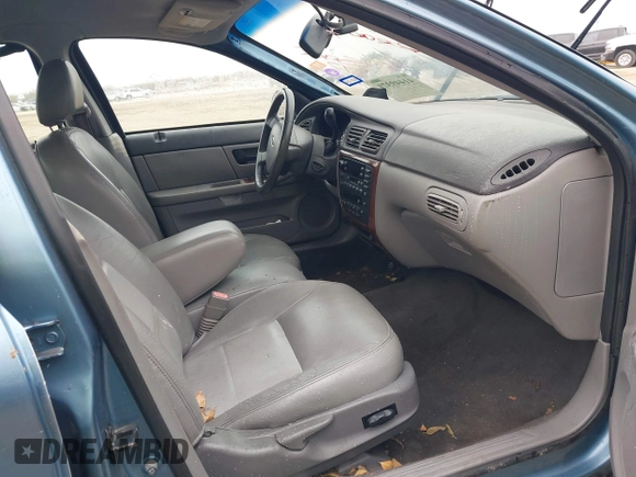 2006 Ford Taurus with VIN 1FAHP56U96A216511, listed as a IAAI auction lot 41449371 with Not provided miles and . Bid and sale history available at DreamBid. Image 5.