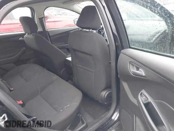 2016 Ford Focus SE z VIN 1FADP3F25GL386582, wystawiony jako IAAI lot #41097395 z przebiegiem 101 479 mil mil oraz . Historia ofert i sprzedaży dostępna na DreamBid. Obrazek 8.