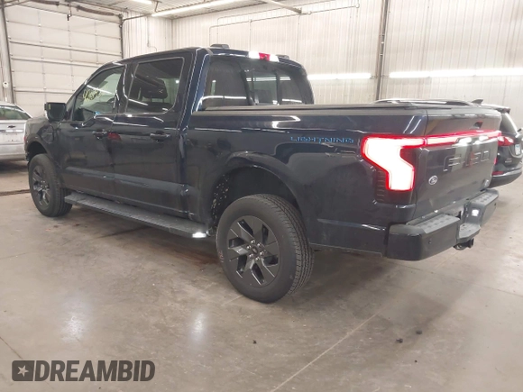 2023 Ford F-150 Lightning Pro with VIN 1FTVW1EL4PWG22900, listed as a IAAI auction lot 42139391 with 6,569 mi miles and . Bid and sale history available at DreamBid. Image 3.