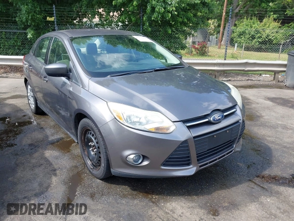 2012 Ford Focus SE z VIN 1FAHP3F22CL125941, wystawiony jako IAAI lot #42176898 z przebiegiem 157 940 mil mil oraz . Historia ofert i sprzedaży dostępna na DreamBid. Obrazek 1.
