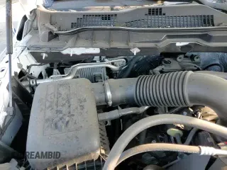 2021 Ram 1500 Tradesman z VIN 3C6RR7KT7MG665371, wystawiony jako Copart lot #68476425 z przebiegiem 94 190 mil mil oraz Szkoda całkowita • Salvage title. Historia ofert i sprzedaży dostępna na DreamBid. Obrazek 14.