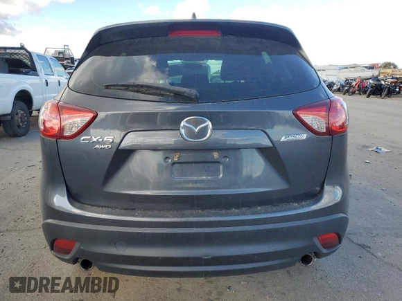 2015 Mazda CX-5 Sport with VIN JM3KE4BE0F0441203, listed as a Copart auction lot 79968514 with 134,890 mi miles and Salvage title. Bid and sale history available at DreamBid. Image 6.