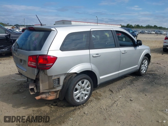 2014 Dodge Journey SE with VIN 3C4PDCAB7ET268221, listed as a IAAI auction lot 40262445 with 153,490 mi miles and . Bid and sale history available at carsss.com. Image 4.