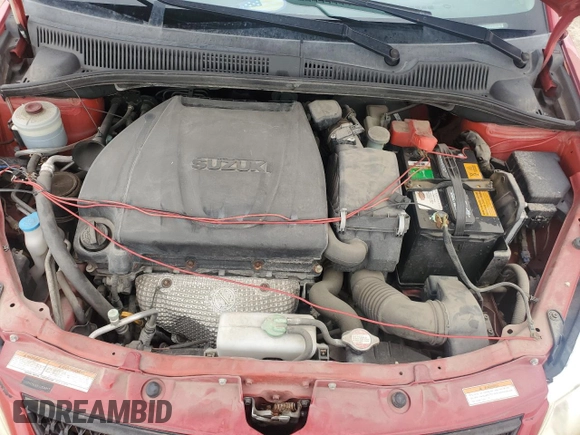 2012 Suzuki SX4 LE z VIN JS2YC5A33C6304897, wystawiony jako Copart lot #55567505 z przebiegiem 42 968 mil mil oraz Szkoda całkowita • Salvage title. Historia ofert i sprzedaży dostępna na DreamBid. Obrazek 11.