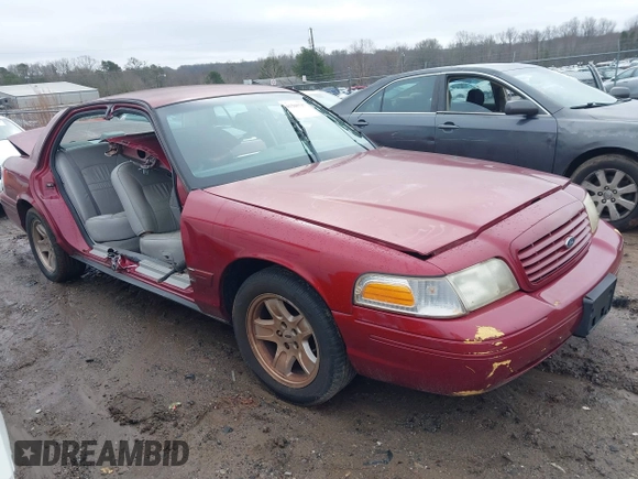 2002 Ford Crown Victoria LX z VIN 2FAFP74W82X148324, wystawiony jako IAAI lot #41565717 z przebiegiem 114 536 mil mil oraz . Historia ofert i sprzedaży dostępna na DreamBid. Obrazek 1.