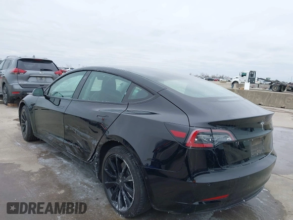 2022 Tesla Model 3 with VIN 5YJ3E1EA0NF191336, listed as a IAAI auction lot 41600441 with 126,671 mi miles and . Bid and sale history available at DreamBid. Image 3.