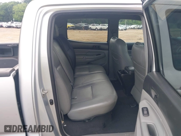 2012 Toyota Tacoma with VIN 3TMMU4FN2CM046933, listed as a IAAI auction lot 42512293 with 221,714 mi miles and . Bid and sale history available at DreamBid. Image 8.