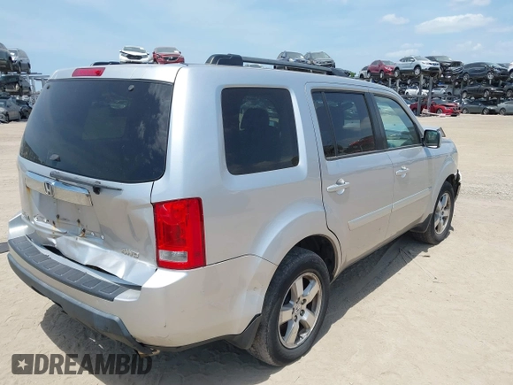 2011 Honda Pilot EX-L with VIN 5FNYF4H54BB099550, listed as a IAAI auction lot 42107327 with 217,050 mi miles and . Bid and sale history available at carsss.com. Image 4.