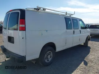 2013 Chevrolet Express Cargo Van with VIN 1GCWGGCA3D1117610, listed as a IAAI auction lot 41196391 with 201,350 mi miles. Bid and sale history available at carsss.com. Image 4.