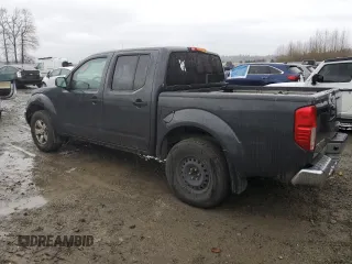 2010 Nissan Frontier LE with VIN 1N6AD0EV0AC436406, listed as a Copart auction lot 43228375 with 165,792 mi miles and Salvage title. Bid and sale history available at DreamBid. Image 2.