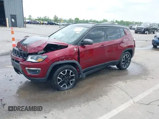 2021 Jeep Compass Trailhawk with VIN 3C4NJDDB6MT502932, listed as a IAAI auction lot 42209945 with 63,119 mi miles and . Bid and sale history available at DreamBid. Image 2.