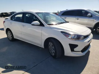 2023 Kia Rio S with VIN 3KPA24AD2PE579419, listed as a Copart auction lot 73399664 with 47,857 mi miles and Salvage Title. Bid and sale history available at DreamBid. Image 4.