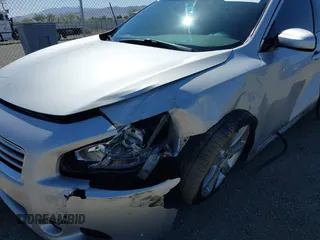 2014 Nissan Maxima S z VIN 1N4AA5APXEC450907, wystawiony jako IAAI lot #41998184 z przebiegiem 186 314 mil mil oraz . Historia ofert i sprzedaży dostępna na DreamBid. Obrazek 6.