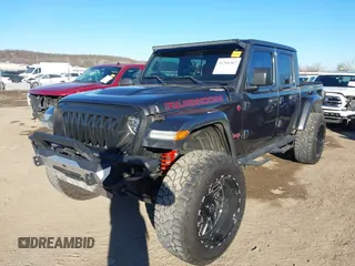 2020 Jeep Gladiator Rubicon with VIN 1C6JJTBG5LL179188, listed as a IAAI auction lot 41316367 with 136,670 mi miles and . Bid and sale history available at DreamBid. Image 6.