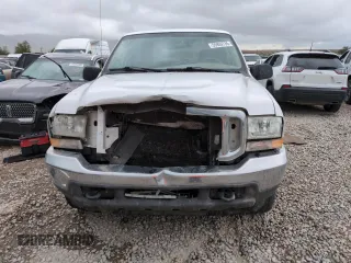 2004 Ford Excursion Special Serv with VIN 1FMNU41L04EB33694, listed as a Copart auction lot 55959735 with 183,692 mi miles and Salvage title. Bid and sale history available at DreamBid. Image 5.