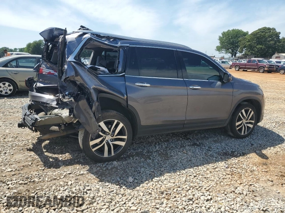 2018 Honda Pilot Elite with VIN 5FNYF6H06JB055564, listed as a Copart auction lot 57170465 with Not provided miles and Salvage title. Bid and sale history available at DreamBid. Image 3.