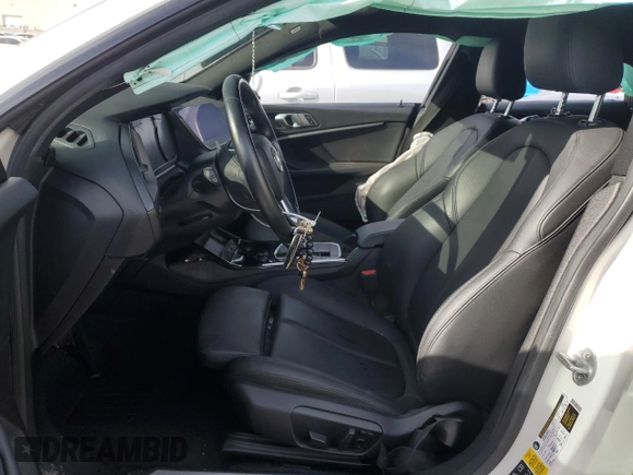 2021 BMW 2 Series 228i xDrive with VIN WBA73AK00M7G52266, listed as a Copart auction lot 87717915 with 63,575 mi miles and Salvage Title. Bid and sale history available at DreamBid. Image 7.