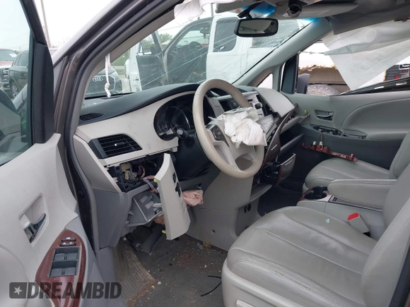 2013 Toyota Sienna XLE AAS with VIN 5TDYK3DC5DS405535, listed as a IAAI auction lot 42348931 with 186,177 mi miles and . Bid and sale history available at DreamBid. Image 5.