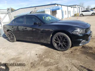 2018 Dodge Charger SXT Plus with VIN 2C3CDXHG4JH125077, listed as a Copart auction lot 46677265 with 114,673 mi miles and Salvage Title. Bid and sale history available at carsss.com. Image 4.