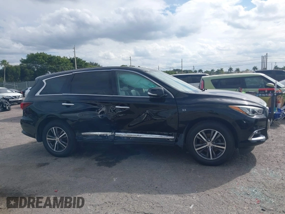 2019 Infiniti QX60 LUXE with VIN 5N1DL0MN0KC549578, listed as a IAAI auction lot 41362311 with 162,457 mi miles. Bid and sale history available at carsss.com. Image 6.