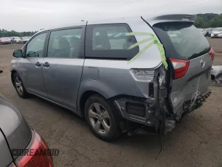 2015 Toyota Sienna L with VIN 5TDZK3DCXFS620092, listed as a Copart auction lot 61606095 with 130,624 mi miles and Salvage title. Bid and sale history available at DreamBid. Image 2.