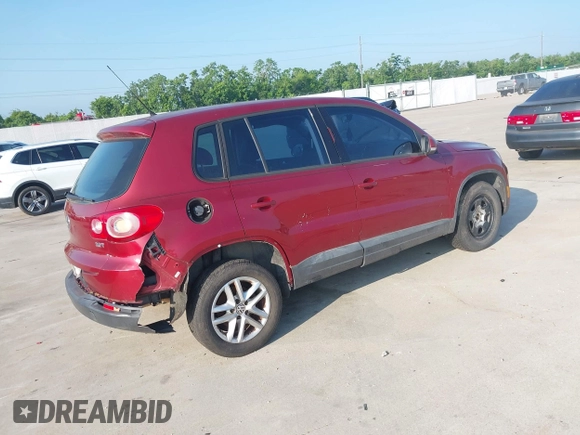 2011 Volkswagen Tiguan SEL w/Premium Navi with VIN WVGAV7AX4BW001402, listed as a IAAI auction lot 42406619 with 183,035 mi miles and . Bid and sale history available at DreamBid. Image 4.