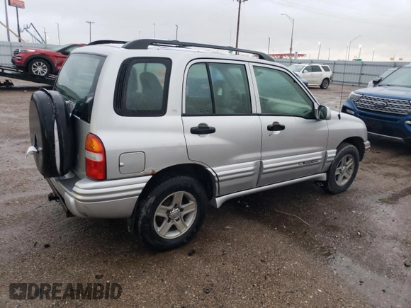2002 Chevrolet Tracker LT z VIN 2CNBJ634526917089, wystawiony jako Copart lot #79265434 z przebiegiem 131 081 mil mil oraz Czysty tytuł • Clean title. Historia ofert i sprzedaży dostępna na DreamBid. Obrazek 3.