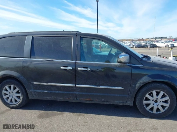 2011 Chrysler Town & Country Touring-L with VIN 2A4RR8DG5BR704183, listed as a IAAI auction lot 41448878 with 177,318 mi miles. Bid and sale history available at carsss.com. Image 13.