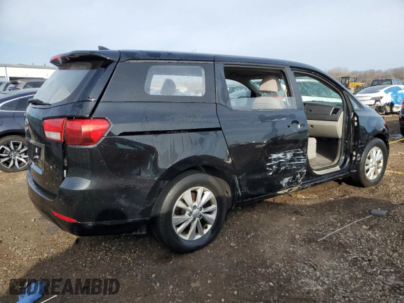 2016 Kia Sedona L with VIN KNDMA5C15G6138723, listed as a Copart auction lot 48953375 with 106,995 mi miles and Salvage Title. Bid and sale history available at DreamBid. Image 3.