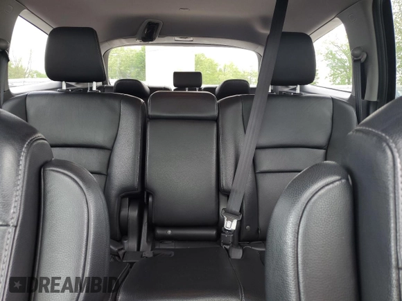 2019 Honda Pilot Touring 8-Passenger z VIN 5FNYF6H99KB005676, wystawiony jako Copart lot #56172085 z przebiegiem 117 274 mil mil oraz Czysty tytuł • Clean title. Historia ofert i sprzedaży dostępna na DreamBid. Obrazek 10.