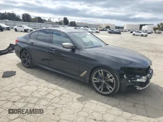 2020 BMW 5 Series M550i xDrive z VIN WBAJS7C09LCE11953, wystawiony jako Copart lot #49773175 z przebiegiem 40 329 mil mil oraz Szkoda całkowita • Salvage title. Historia ofert i sprzedaży dostępna na DreamBid. Obrazek 4.