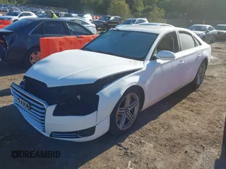 2013 Audi A8 4.0L with VIN WAUA2AFD9DN017867, listed as a IAAI auction lot 40430651 with 114,928 mi miles and . Bid and sale history available at DreamBid. Image 17.