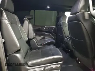 2023 Cadillac Escalade ESV 4WD Premium Luxury z VIN 1GYS4KKL7PR268558, wystawiony jako Copart lot #89128085 z przebiegiem 62 628 mil mil oraz Czysty tytuł • Clean title. Historia ofert i sprzedaży dostępna na DreamBid. Obrazek 11.