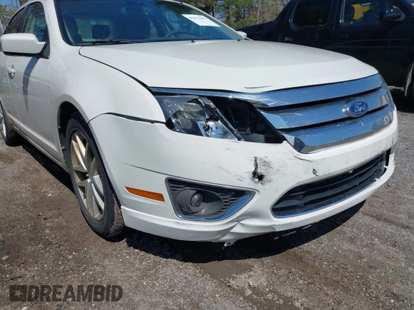 2011 Ford Fusion SEL with VIN 3FAHP0JG3BR160179, listed as a IAAI auction lot 41672819 with 164,195 mi miles and . Bid and sale history available at DreamBid. Image 6.