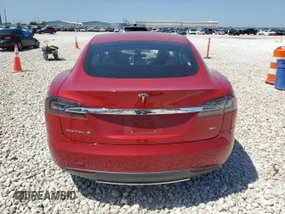 2013 Tesla Model S with VIN 5YJSA1CN1DFP26864, listed as a Copart auction lot 52029485 with 63,260 mi miles and Salvage Title. Bid and sale history available at DreamBid. Image 6.