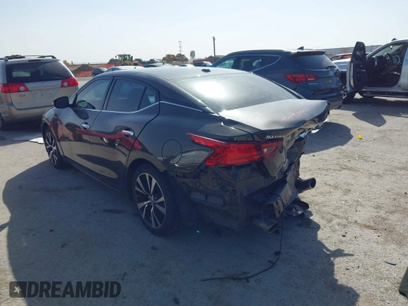 2016 Nissan Maxima Platinum with VIN 1N4AA6AP2GC385723, listed as a IAAI auction lot 41753328 with 162,845 mi miles and . Bid and sale history available at DreamBid. Image 3.