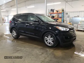 2013 Hyundai Santa Fe Sport z VIN 5XYZUDLA5DG076949, wystawiony jako Copart lot #55758515 z przebiegiem 168 636 mil mil oraz Szkoda całkowita • Salvage title. Historia ofert i sprzedaży dostępna na DreamBid. Obrazek 4.