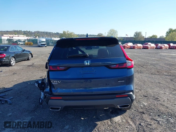2025 Honda CR-V Sport Touring with VIN 2HKRS6H90SH809835, listed as a IAAI auction lot 42060201 with 9,358 mi miles and . Bid and sale history available at DreamBid. Image 17.