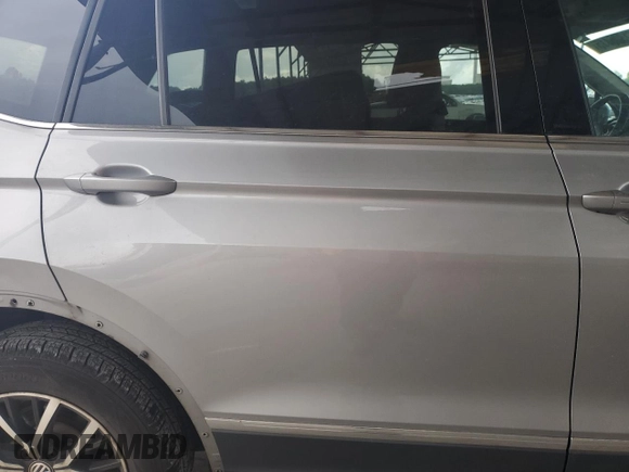 2021 Volkswagen Tiguan SE z VIN 3VV3B7AX1MM126044, wystawiony jako Copart lot #61306415 z przebiegiem 73 159 mil mil oraz Szkoda całkowita • Salvage title. Historia ofert i sprzedaży dostępna na DreamBid. Obrazek 10.