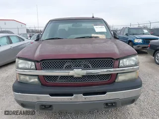 2003 Chevrolet Silverado 1500 LS with VIN 2GCEK19TX31219785, listed as a IAAI auction lot 41716084 with 297,991 mi miles. Bid and sale history available at carsss.com. Image 6.