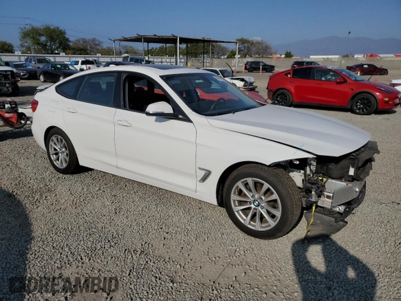 2014 BMW 3 Series 328i Gran Turismo xDrive with VIN WBA3X5C57ED242679, listed as a Copart auction lot 48598665 with 69,712 mi miles and Salvage title. Bid and sale history available at DreamBid. Image 4.