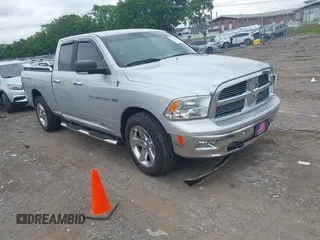 2012 Ram 1500 Big Horn z VIN 1C6RD6GT5CS160356, wystawiony jako IAAI lot #42220824 z przebiegiem 66 073 mil mil oraz . Historia ofert i sprzedaży dostępna na DreamBid. Obrazek 1.